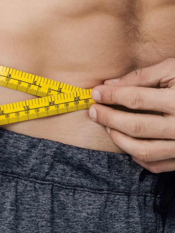 panoramic-shot-of-shirtless-man-measuring-waist.jpg Semaglutide and tirzepatide medical weight loss treatment Glendale