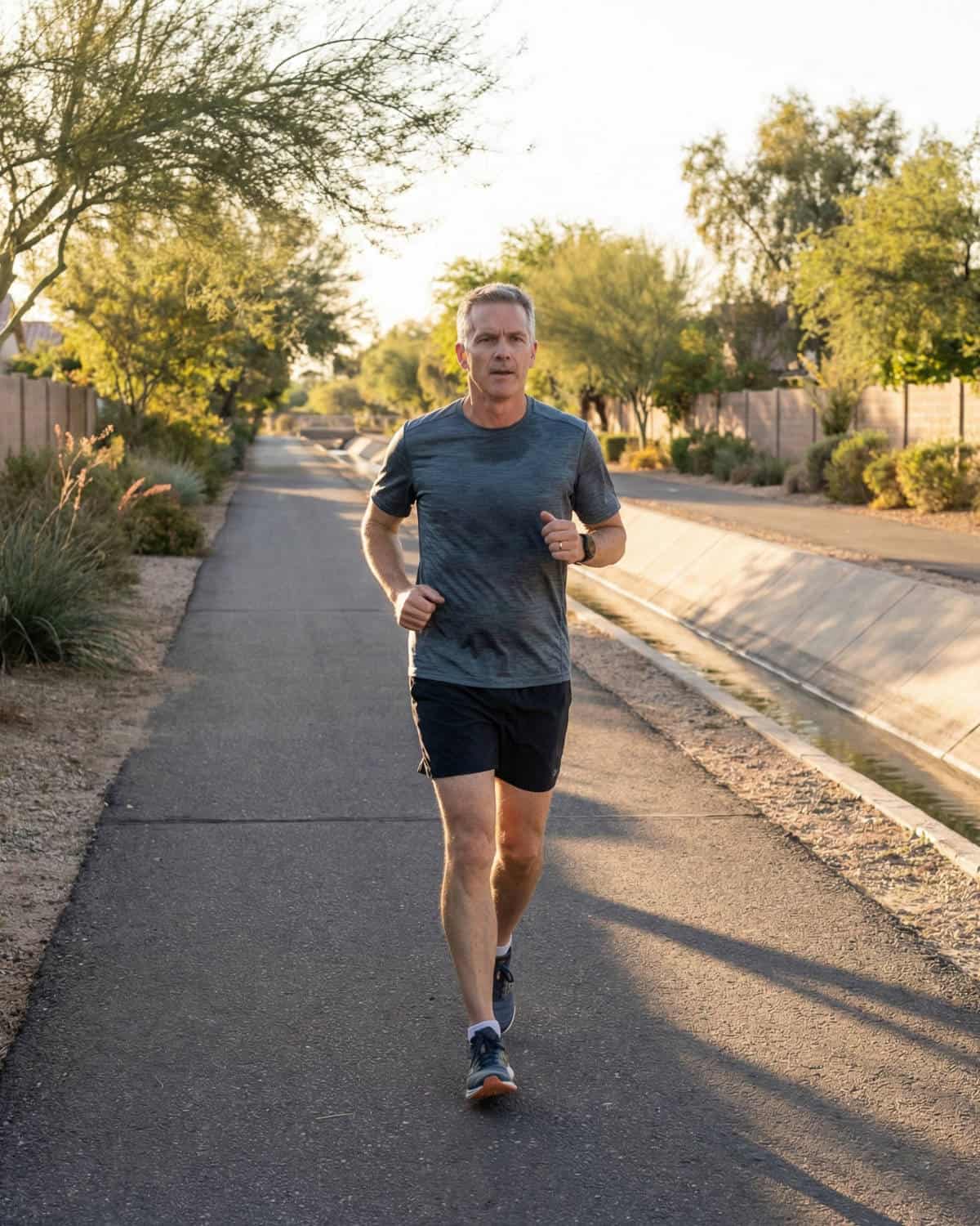 Man jogging for cardiovascular and metabolic health in Glendale AZ